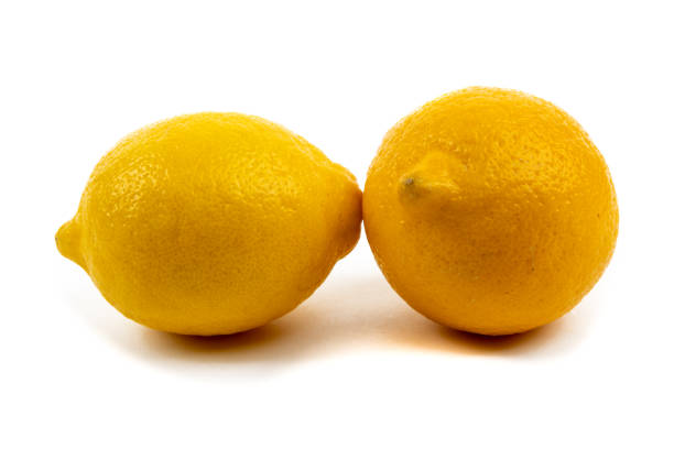 Lemons in a bowl against white background.THIS IMAGE IS ONLY AVAILABLE HERE AT ISTOCKPHOTO
