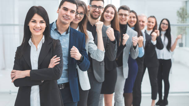 istock group of happy young people standing in a row 1278853129