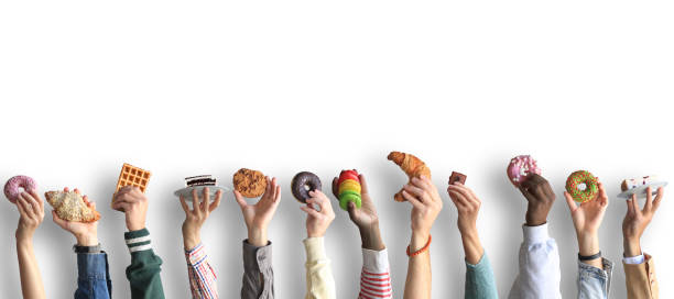 istock People are holding different desserts in their hands. 1278855185