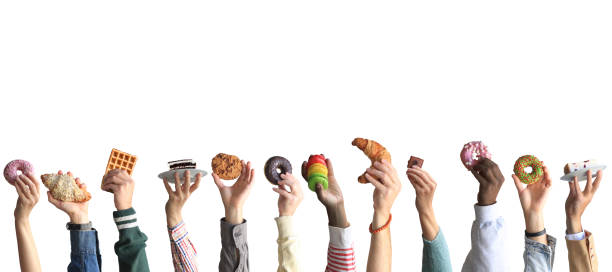 istock People are holding different desserts in their hands. 1278855219