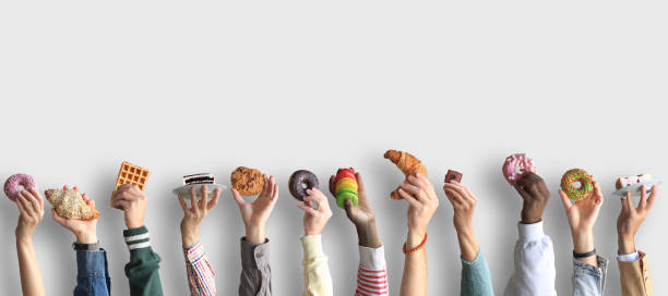 istock People are holding different desserts in their hands. 1278855229