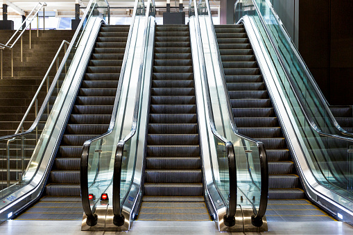 Modern escalator, background with copy space, full frame horizontal composition