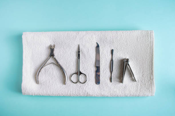 istock Tools for manicure and nail care on blue background. 1278855304
