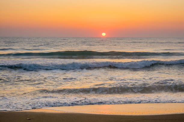 istock Dawn by the sea 1278856350