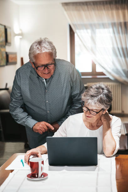 istock Senior couple in video conference call 1278856528