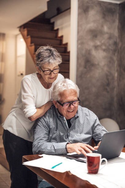 istock Senior couple in video conference call 1278856683