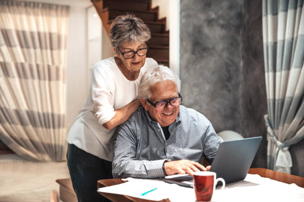 istock Senior couple in video conference call 1278856770