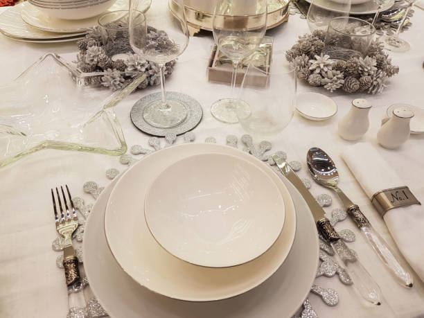 istock Elegant Christmas table setting in white and silver 1278857598