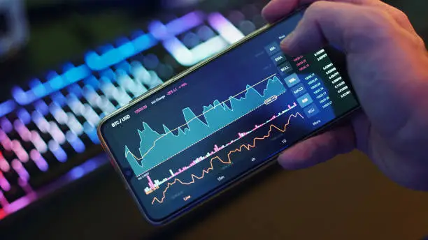 Photo of Mobile Phone Stock Exchange Rates, Bitcoin and US Dollars