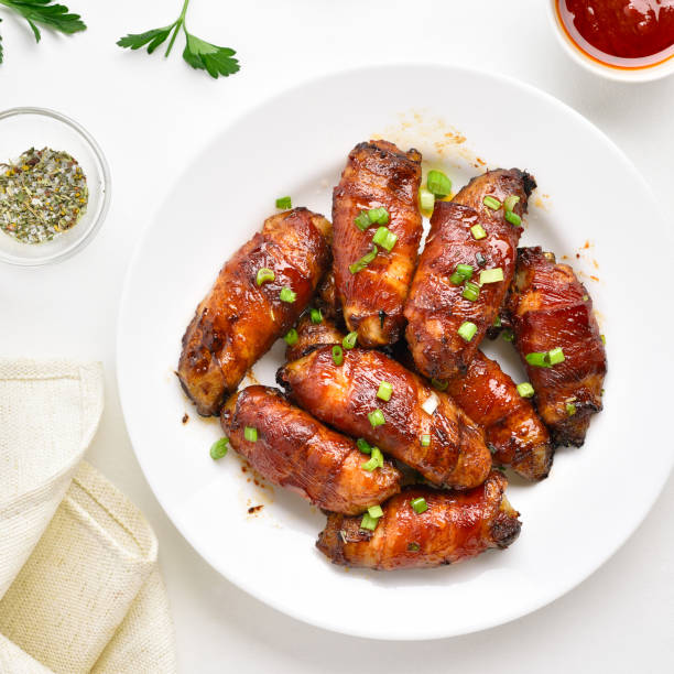 istock Bacon wrapped grilled chicken wings 1278857651