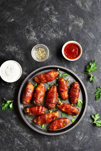 istock Bacon wrapped grilled chicken wings 1278857653