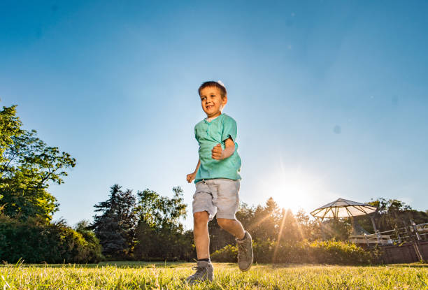 istock Cute boy playing in public park 1278857803
