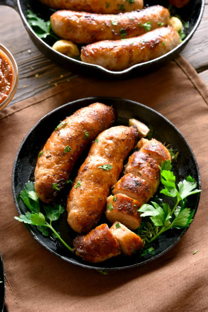 istock Roasted sausages in frying pan 1278857812