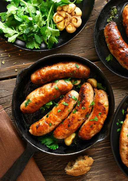 istock Roasted sausages in frying pan 1278857816
