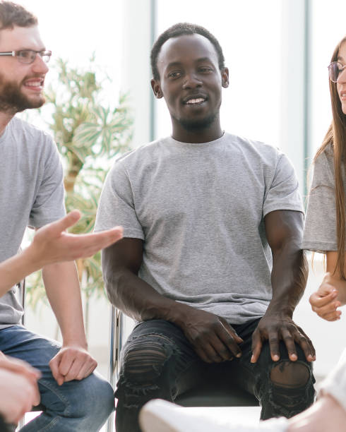istock close up. group of young people disputing during the seminar 1278858740