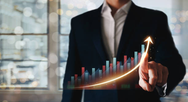 istock Businessman finger pointing arrow graph with chart. Business planning and strategy concept 1278859472