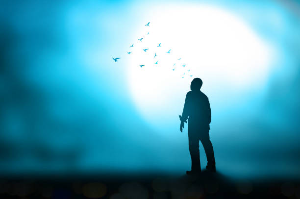 Silhouette of healthy man over blurred full moon background