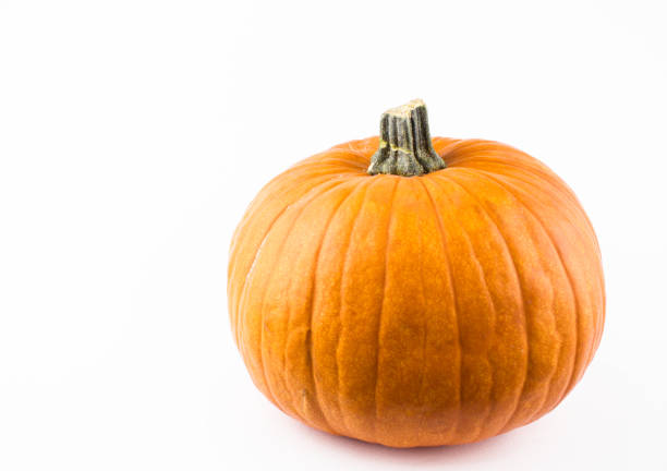 istock Halloween pumpkin on a white background. Ripe orange pumpkin on a white background. Fresh organic pumpkin on a white background. 1278861772