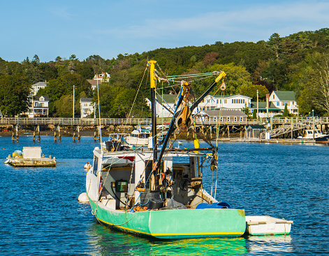 lobster boat moored in Boothbay Harbor, a Maine coastal village