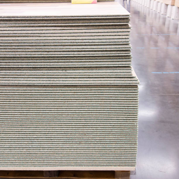 istock stack of Chipboard, background Chipboard with granular texture of the presses 1278867090