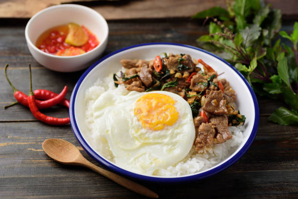 istock Thai food, Stir fried pork with basil and fried egg 1278871799