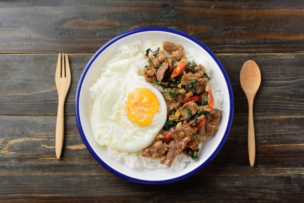 istock Thai food, Stir fried pork with basil and fried egg 1278871849
