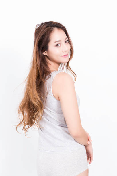 Asian woman long hari stand at home on white background.