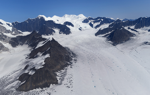 Northern part of the Don Sheldon Amphitheater in Denali with a massive glacier flowing down from a glaciated Mount Silverthrone mountain (13,219 ft/4014 m).