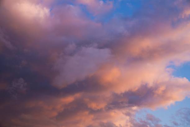 istock pink and orange clouds in a sunset sky 1278890554