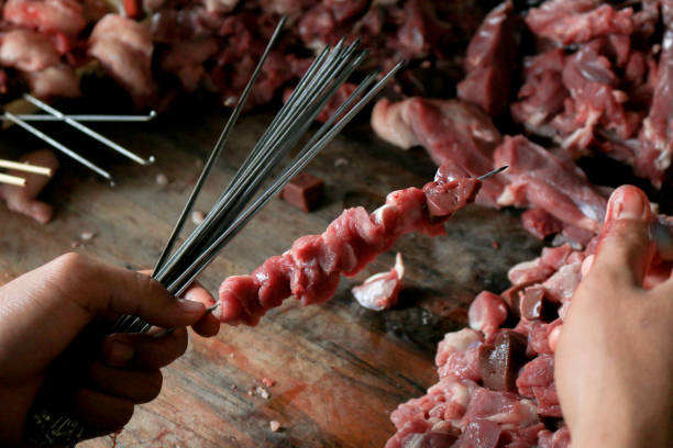 istock Satay Klatak making process. Sate klathak is a unique goat satay or mutton satay dish, originally from Yogyakarta, Indonesia. Indonesian Culinary food 1278891091