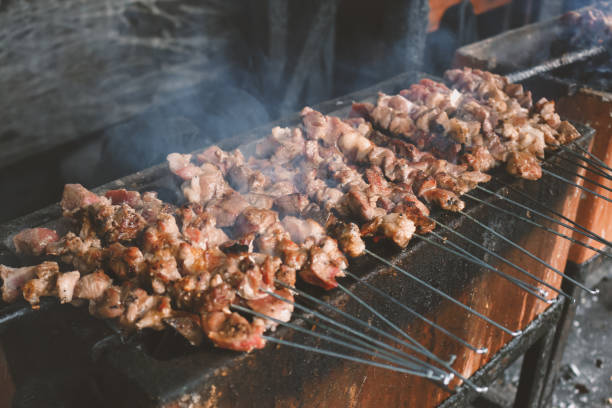 istock Sate Klatak grilling on charcoal grill. Sate klathak is a unique goat satay or mutton satay dish, originally from Yogyakarta, Indonesia. 1278891137
