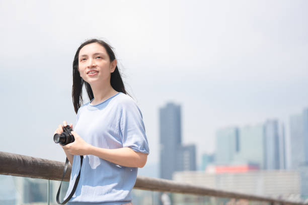 istock Women taking photos with a camera 1278891391