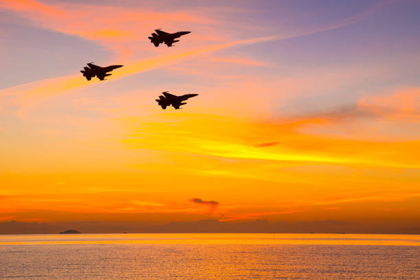 istock Silhouette airplane with beautiful colorful sunset sky background 1278893059