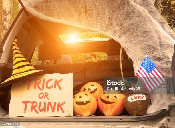Trick Or Trunk Concept Celebrating Halloween In Trunk Of Car New Trend Celebrating Traditional October Holiday Outdoor Social Distance And Safe Alternative Celebration During Coronavirus Covid19 Stock Photo - Download Image Now