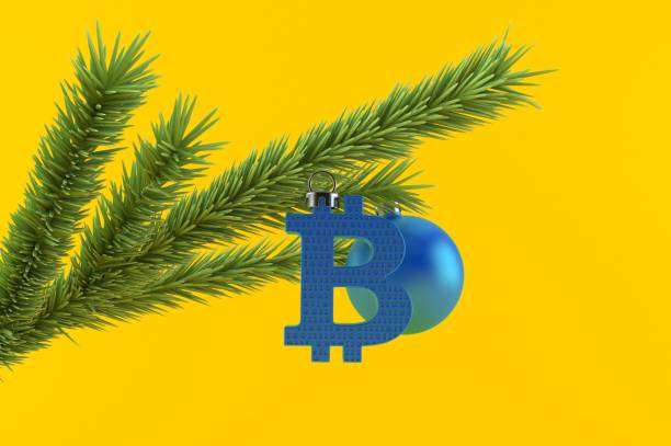 Bitcoin with christmas tree and christmas ornament