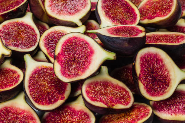istock Tasty figs background. Top view. 1278905313