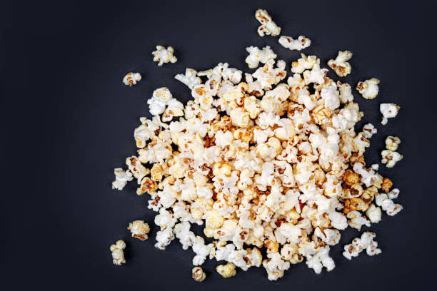 istock Homemade Kettle Corn Popcorn on black background with copy space. Top view
