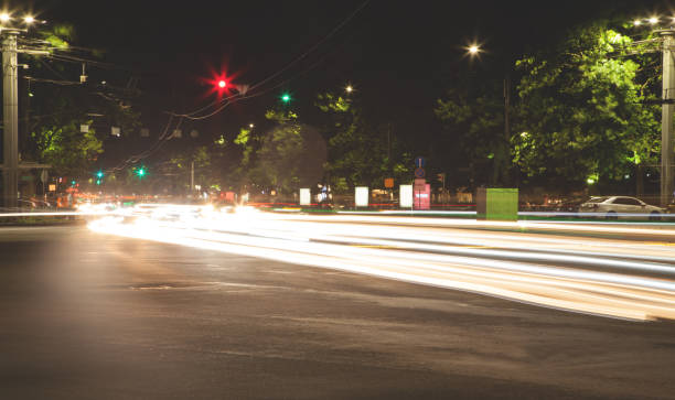 istock Car lights in the night city. Traffic 1278911488