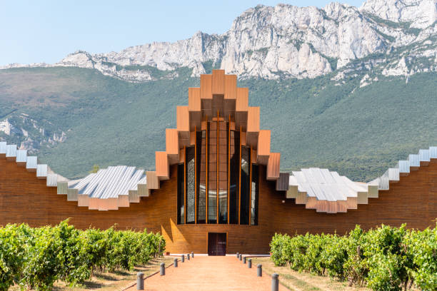 Futuristic architecture winery of Ysios in Alava Laguardia, Spain - 6 August 2020: Ysios winery in Alava, Basque Country. The futuristic building was designed by famous architect Santiago Calatrava rioja photos stock pictures, royalty-free photos & images