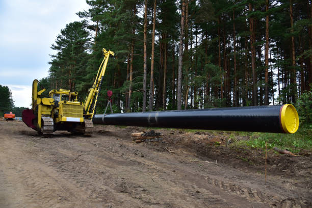 istock Natural gas pipeline construction work in forest area 1278917687