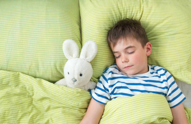 istock Child in the bed 1278923752