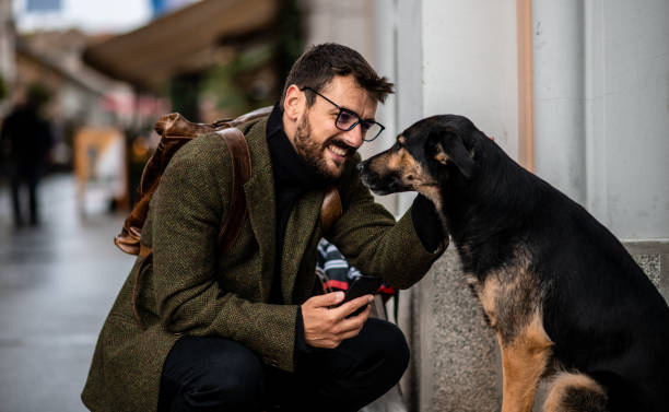 istock Hipster petting the dog 1278924190