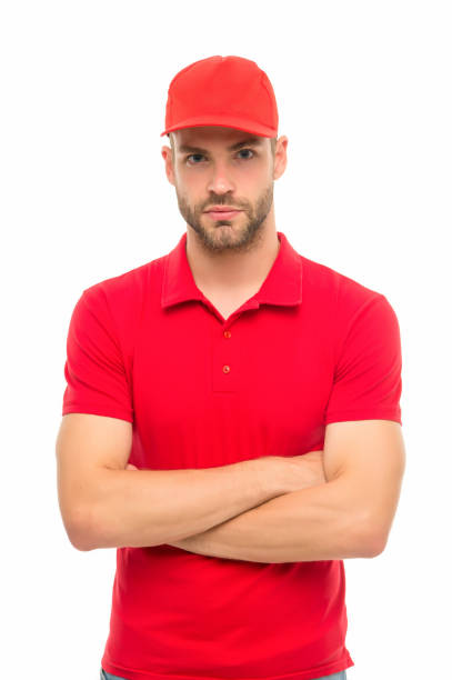 istock Post worker. Help with relocation and move out. Working for your comfort. Man delivery service. Guy in red cap isolated on white background. Express courier service. Shipping and delivery service 1278934043