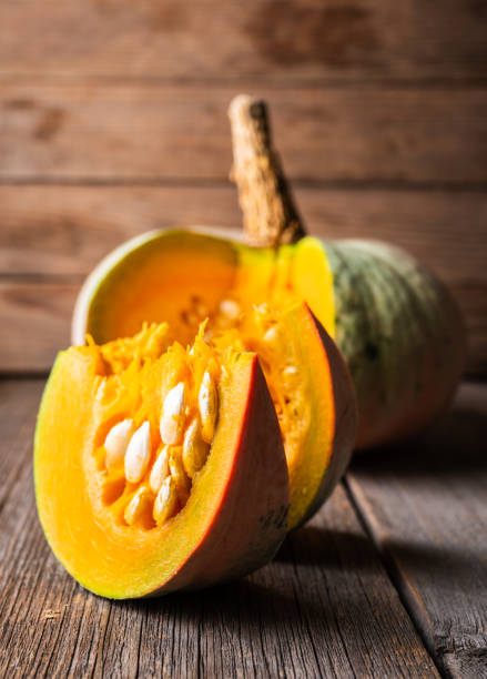 istock Freshly harvested pumpkin sliced on the kitchen table 1278937886