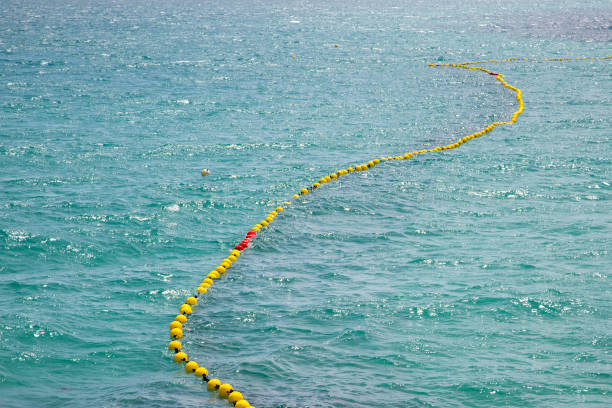 Shark net at Cottesloe beach Shark net at Cottesloe beach in Western Australia cottesloe beach stock pictures, royalty-free photos & images