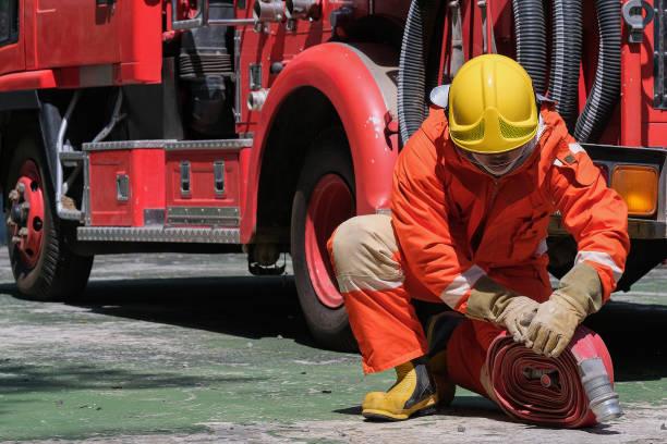 istock Firefighters and Fire hose coil  fire and rescue training school regularly to get ready - help, fire protection concept 1278940112
