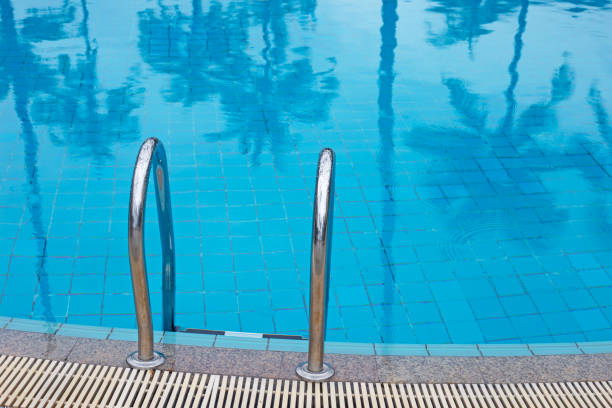 istock Outdoor swimming pool with stair 1278944061