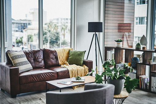 Shot of a furnished living room in a modern apartment