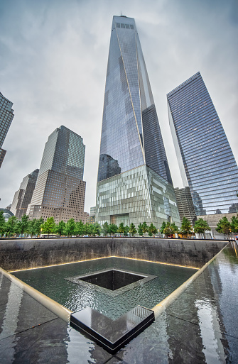 New York, NY, USA - June 4, 2022: Buildings in the World Trade Center complex, including One World Trade Center and St. Nicholas Greek Orthodox Church.