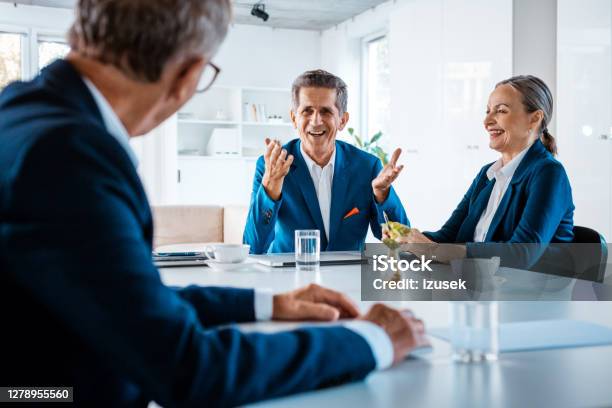 Senior Business People In The Office Stock Photo - Download Image Now - Meeting, Shareholder, Office